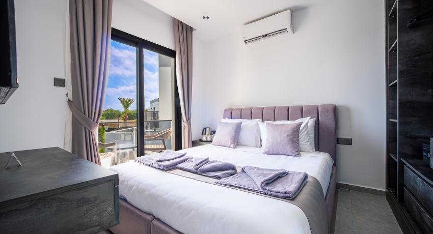 Two Bedroom Family Room with Private Balcony, Mountain & Sea View