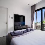 Two Bedroom Family Room with Private Balcony, Mountain & Sea View