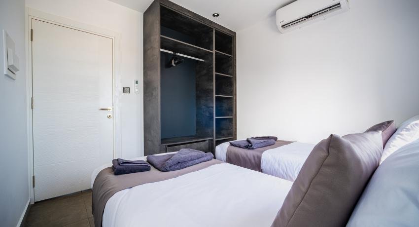 Two Bedroom Family Room with Private Balcony, Mountain & Sea View